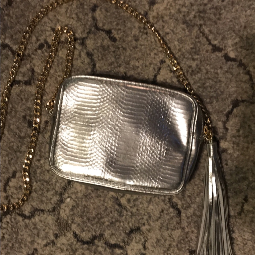 Silver Victoria’s Secret cross body purse